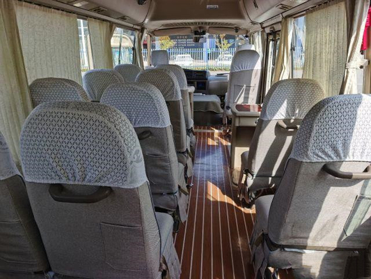 Toyota Coaster Used Bus with full Equipment 20 সীট ব্যবহৃত মিনি বাস 2012 সালে Sliding Window Gasoline Munual Bus