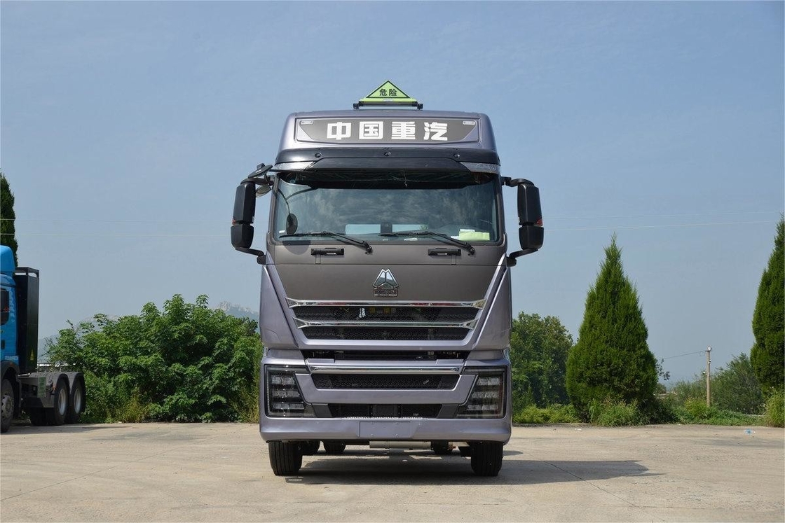 HOWO TH7 ট্রাক 430HP 4X2 AMT স্বয়ংক্রিয় বিপজ্জনক পণ্য ট্র্যাক্টর ফায়ারিং সাইড ফ্লো প্যানেল