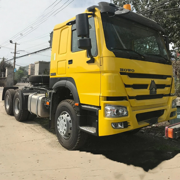 Sinotruk ব্যবহৃত ট্রাক্টর হেড ট্রেলার ট্রাক্টর ট্রাক Howo 6*4 ট্রাক্টর হেডের দাম