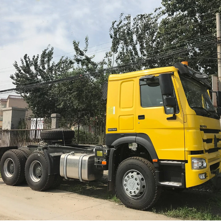 Sinotruk ব্যবহৃত ট্রাক্টর হেড ট্রেলার ট্রাক্টর ট্রাক Howo 6*4 ট্রাক্টর হেডের দাম