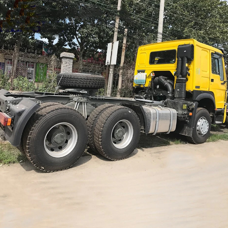 Sinotruk ব্যবহৃত ট্রাক্টর হেড ট্রেলার ট্রাক্টর ট্রাক Howo 6*4 ট্রাক্টর হেডের দাম