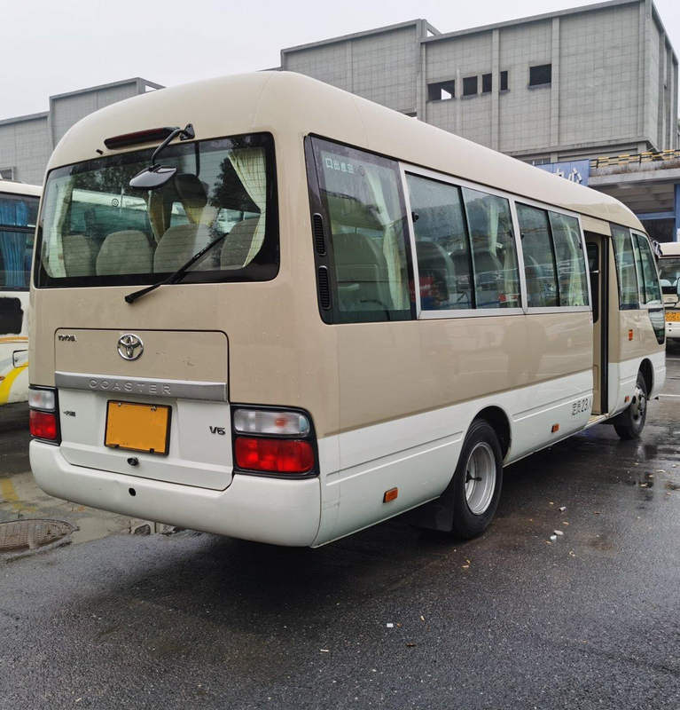 LHD সেকেন্ড হ্যান্ড কোস্টার বাস হিনো ইঞ্জিন 23 সিটার খাকি বাস বিলাসবহুল এ/সি সিস্টেম সহ