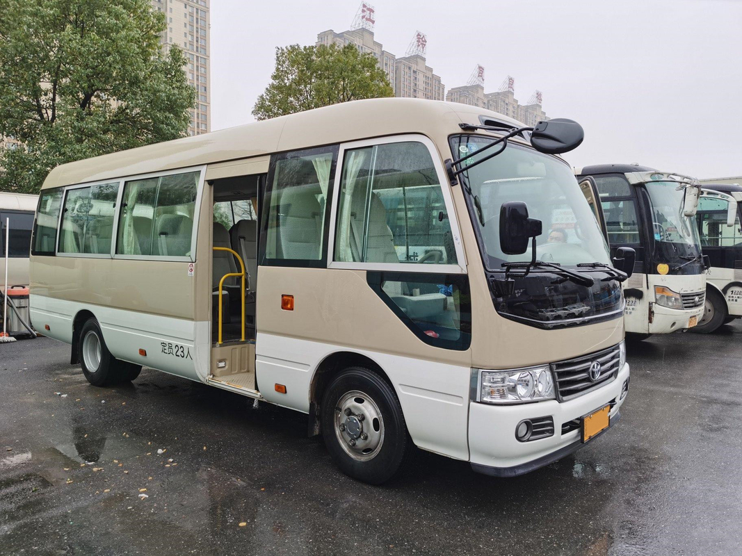 LHD সেকেন্ড হ্যান্ড কোস্টার বাস হিনো ইঞ্জিন 23 সিটার খাকি বাস বিলাসবহুল এ/সি সিস্টেম সহ